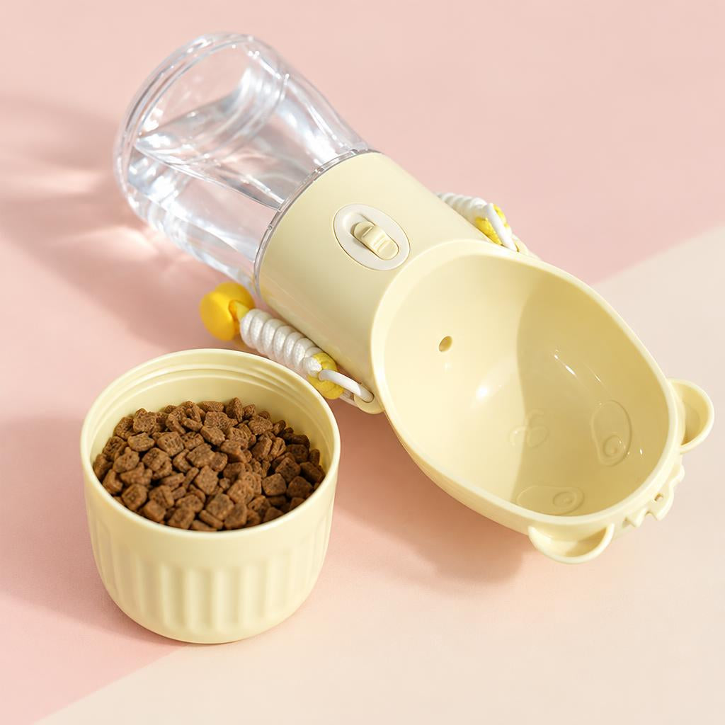 Close-up of the cream 2-in-1 pet travel water bottle with food cup on a soft pink background