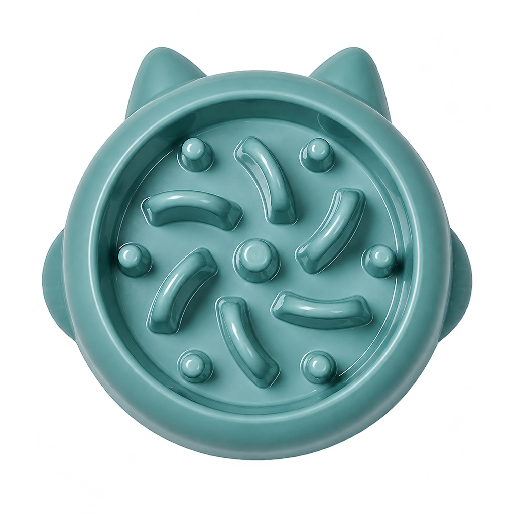 [packshot] Green cat-ear swirl slow feeder bowl on a transparent background, three-quarter view