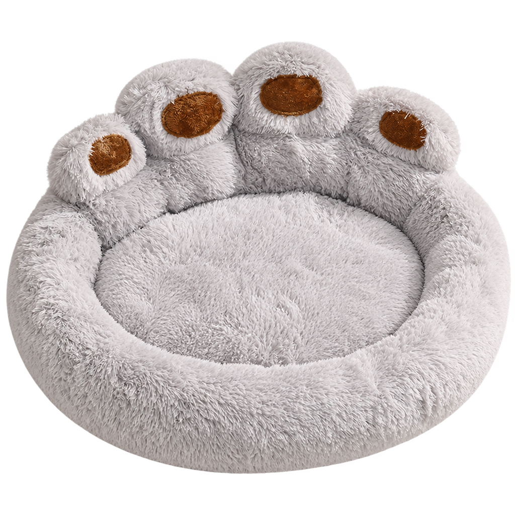 [packshot] Light grey paw-shaped pet bed with four raised paw pads along the back, three-quarter view on a transparent background